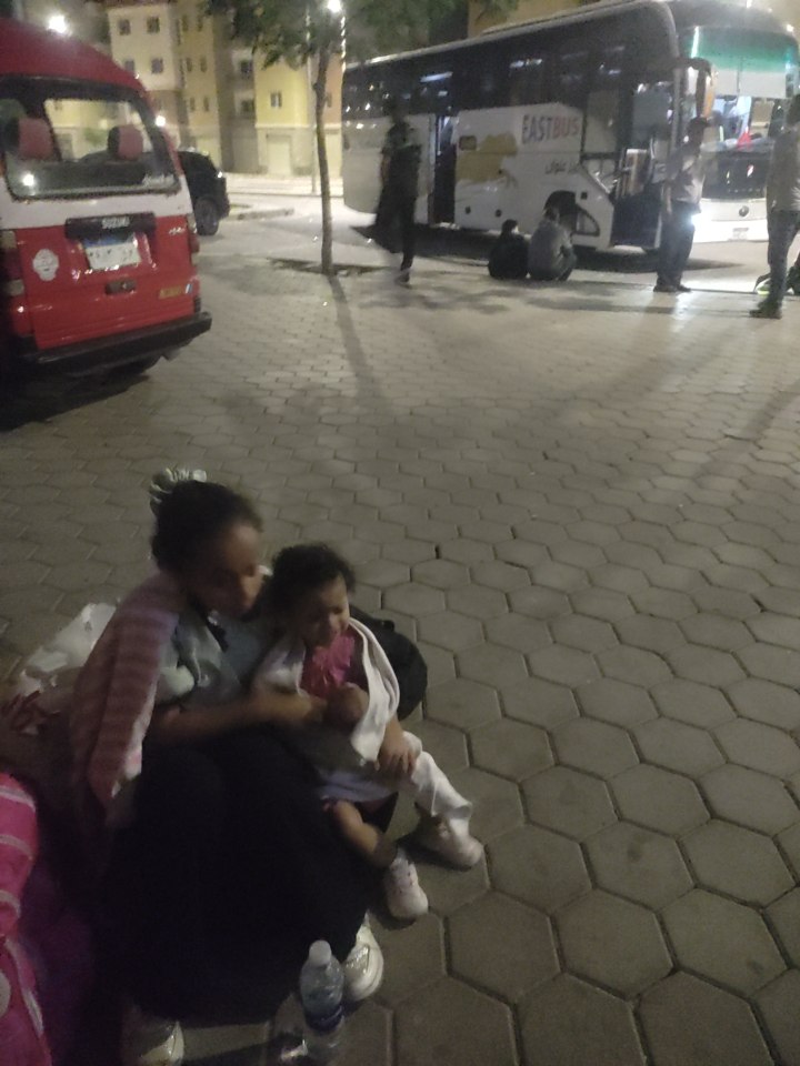 Maryam and Sama at night on the street